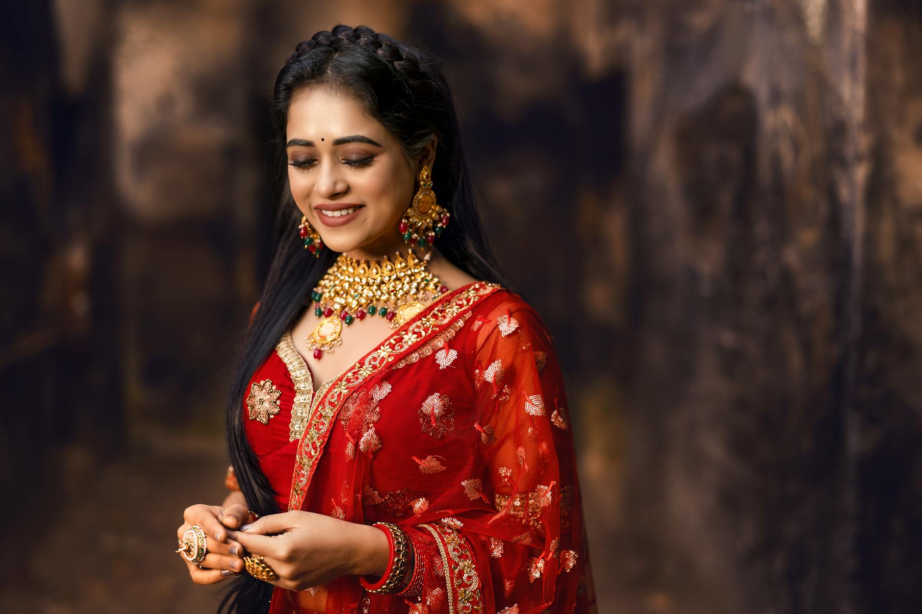 smiling bride in traditional wedding clothing